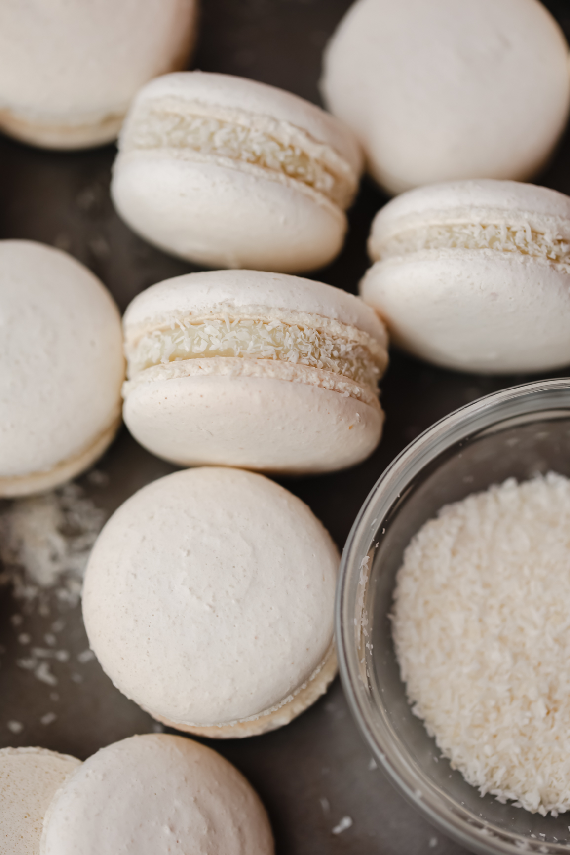 Coconut macarons on the tray. 