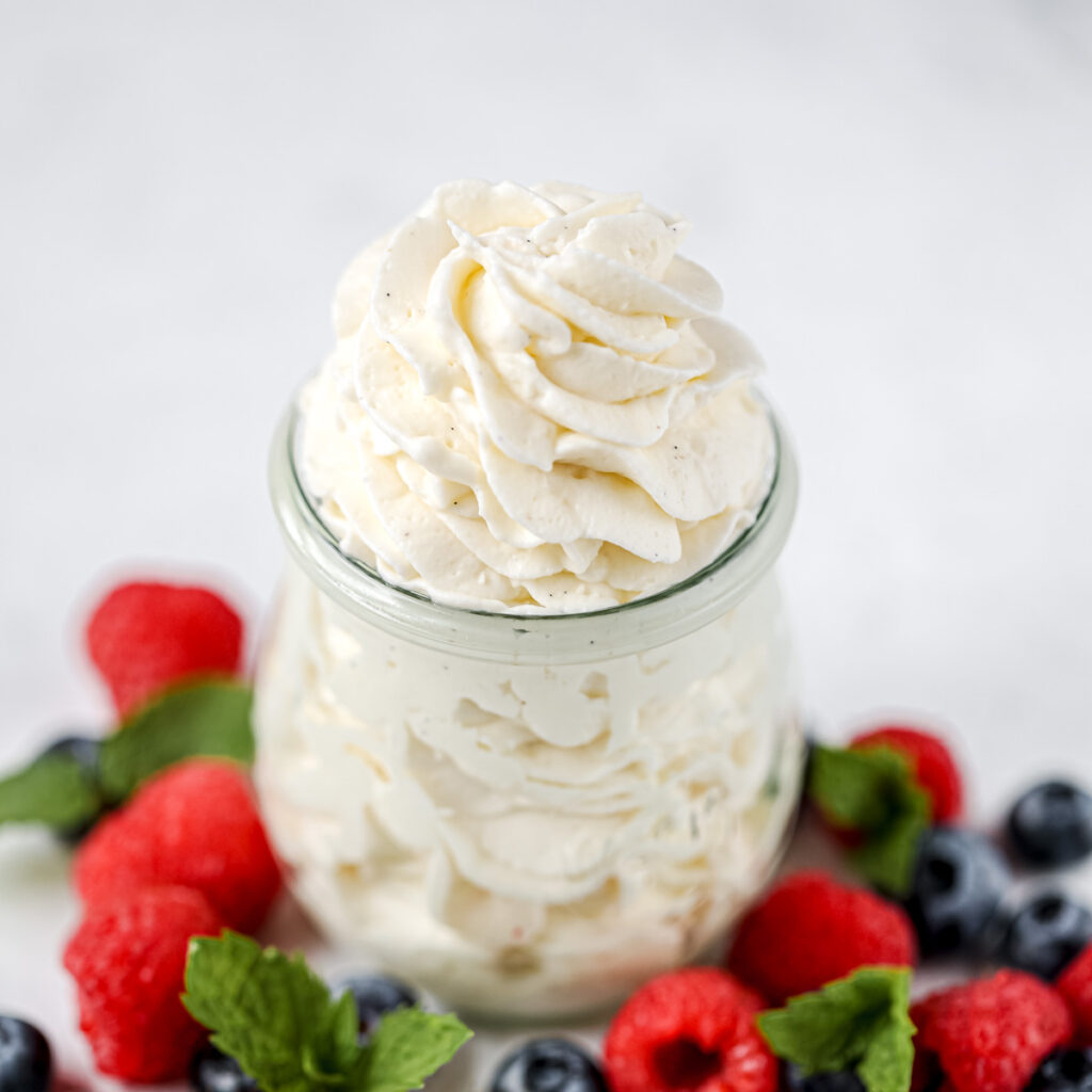 Cream cheese whipped cream in the glass jar.