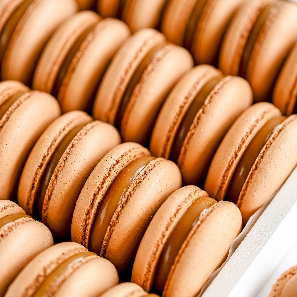 Salted caramel macarons in the box.