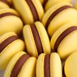 yellow macarons with chocolate filling.
