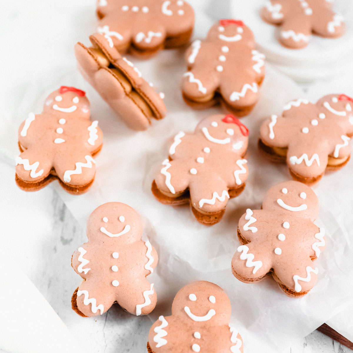 Gingerbread man Macarons on the table.