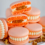 Orange round cookies on the table with walnuts.