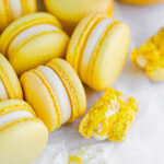 Yellow macarons filled with cheesecake filling.