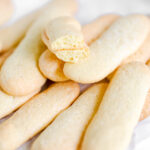Lady fingers cookies on the table.