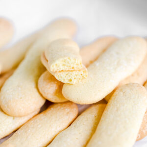 Lady fingers cookies on the table.