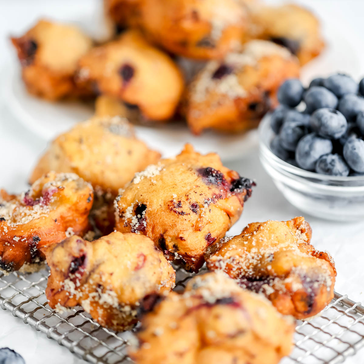 Blueberry fritters on the cooling rock.