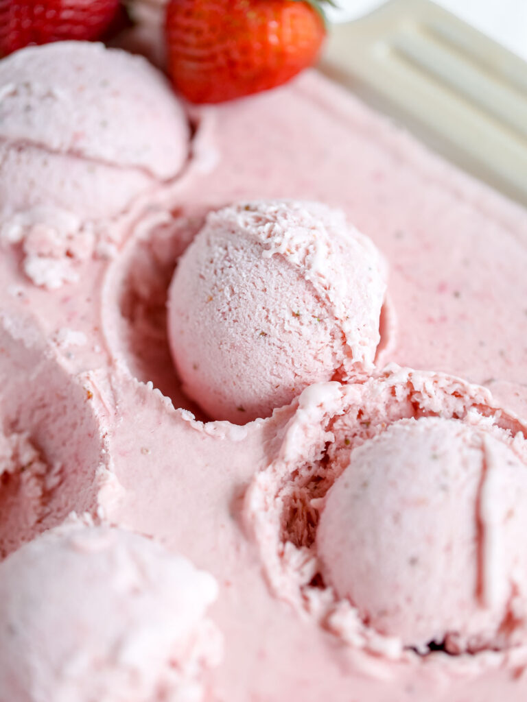 Strawberry ice cream in the bowl. 