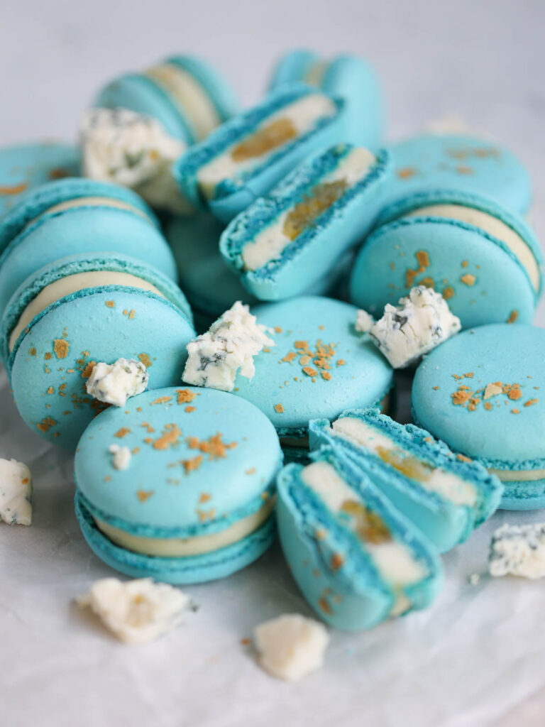 Blue Gorgonzola Pear macarons cut in half.