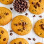 Pumpkin chocolate chip cookies are on the table.