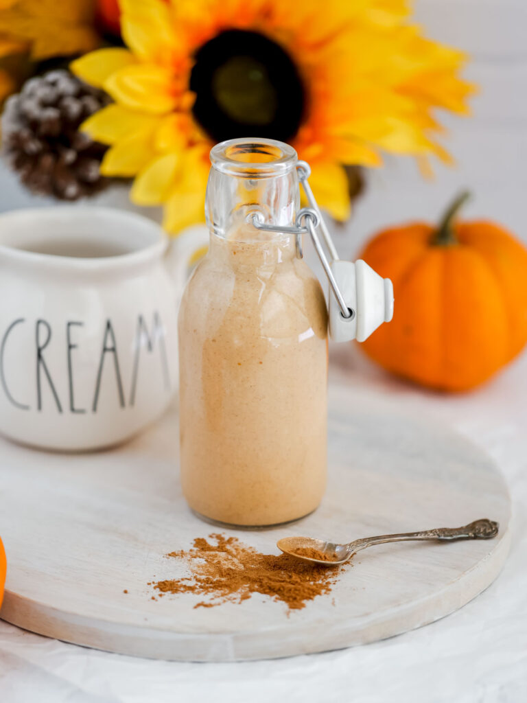 Pumpkin spice creamer in the bottle.