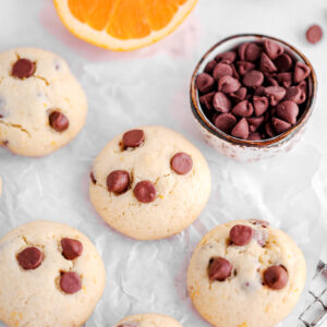 Orange chocolate chip cookies on the table.