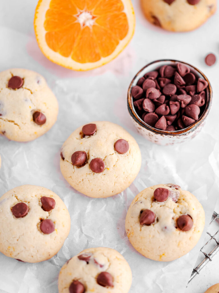 Orange chocolate chip cookies on the table.