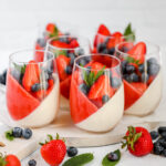 Strawberry Panna Cotta in the glass with fresh fruits.