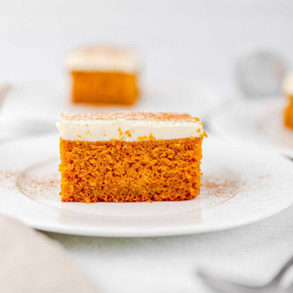 A piece of pumpkin cake on the plate.