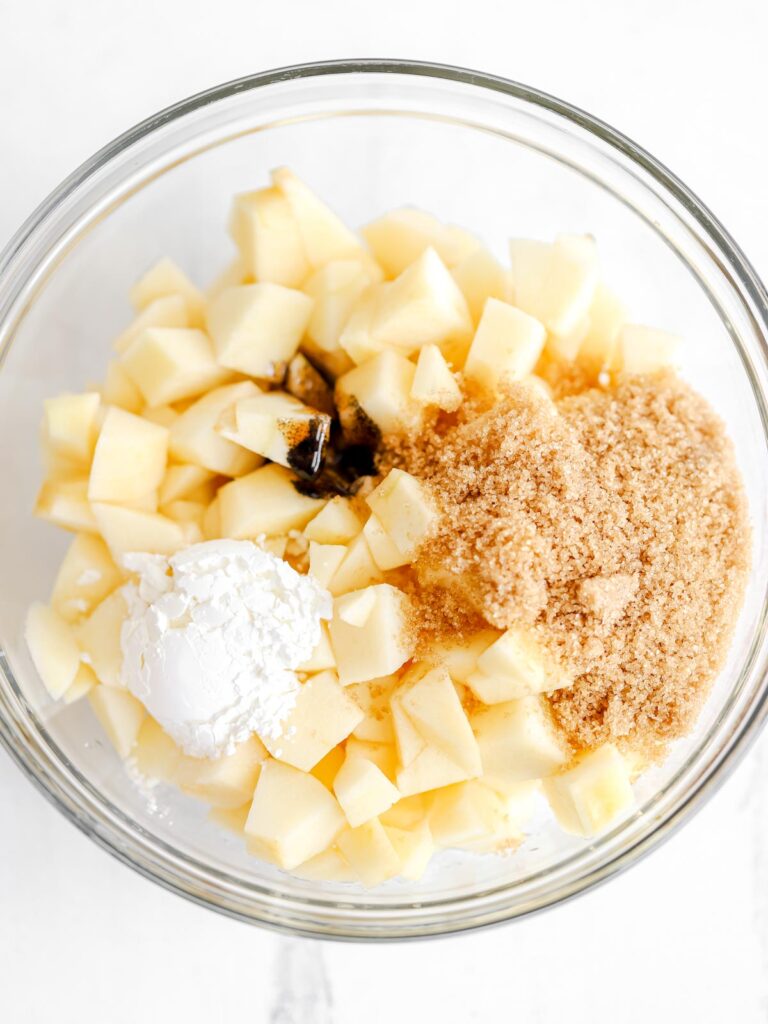 Cut apples in the bowl. 