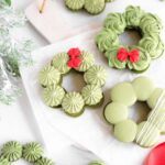 Wreath-shaped macarons on the table.