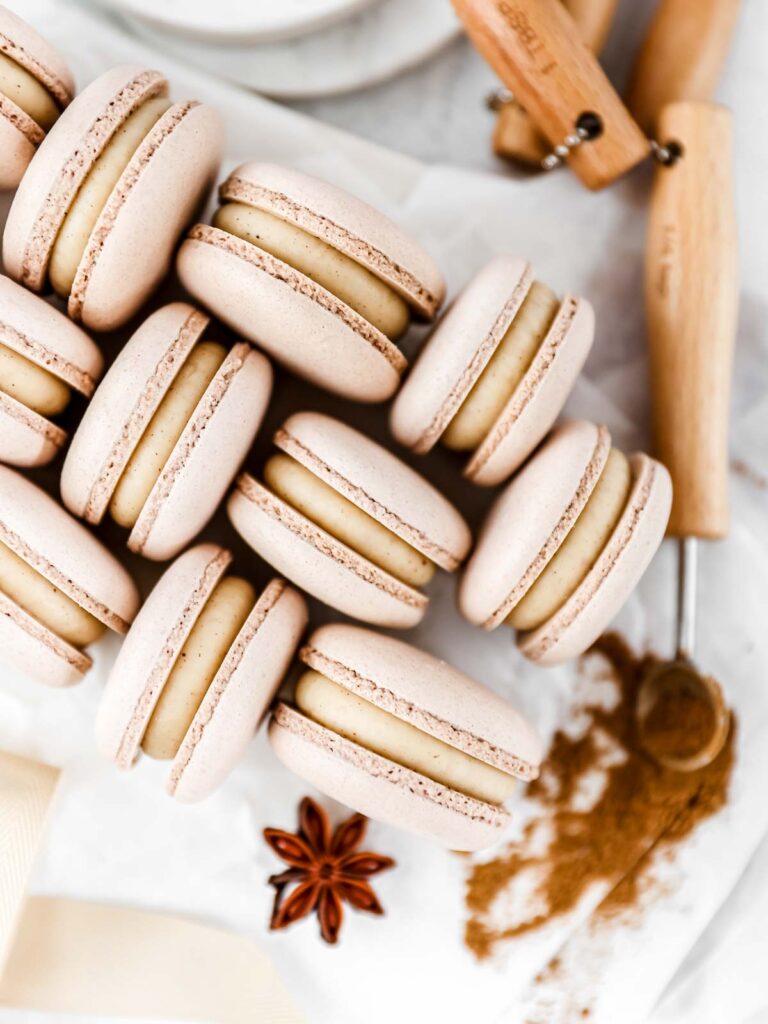 Gingerbread macarons on the table. 