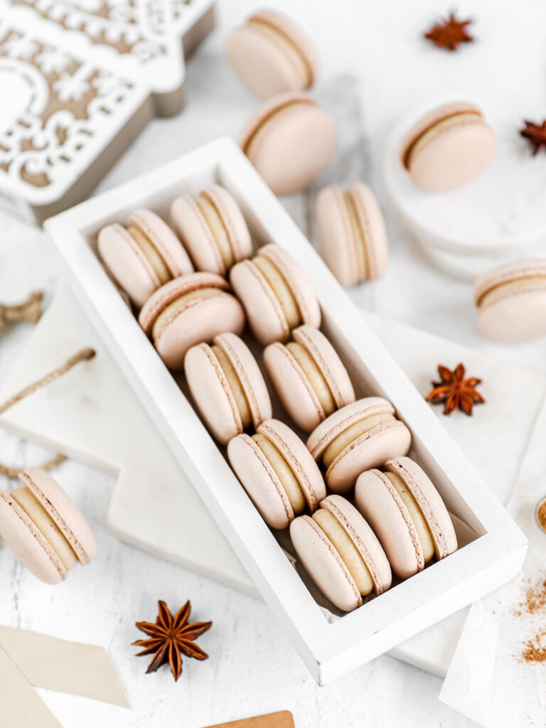 Gingerbread macarons in the box. 