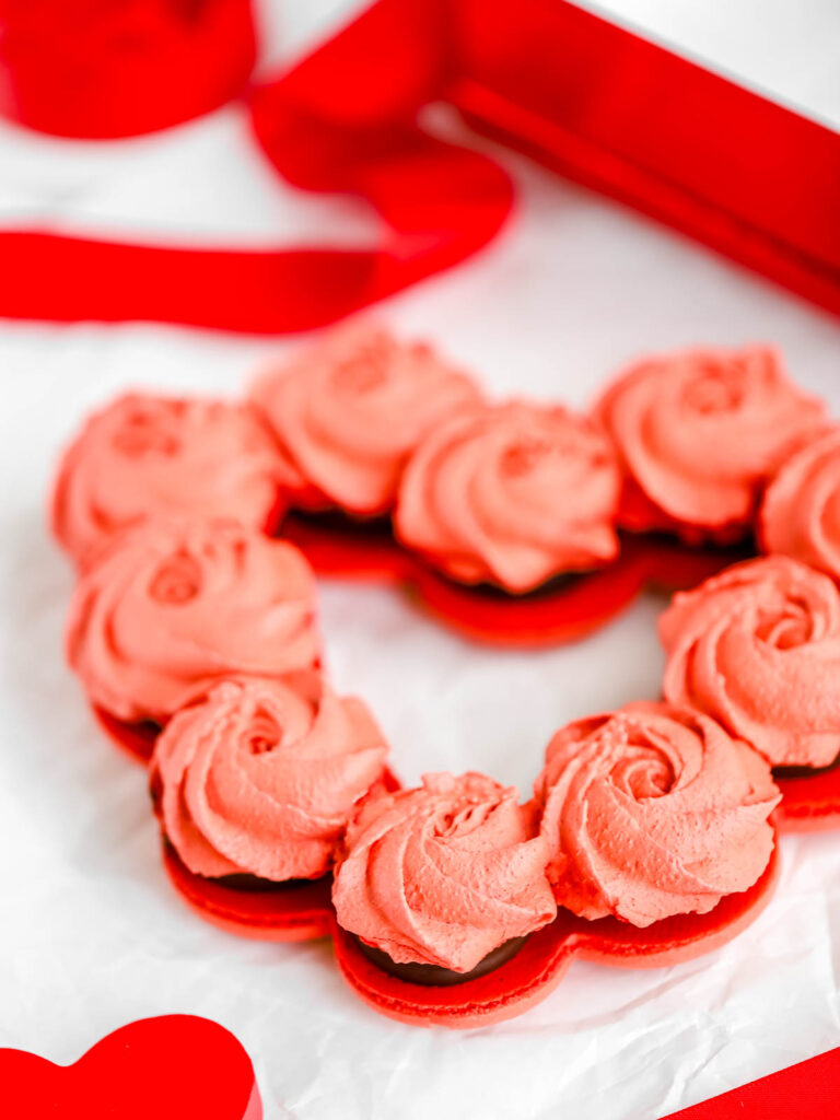 Heart-shaped macaron cake.