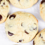 Chunky chocolate chip cookies on the table.