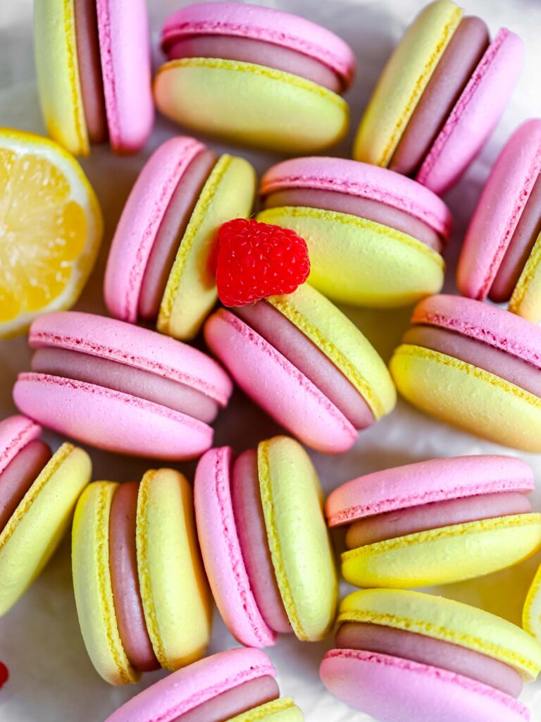 Raspberry Lemon Macarons on the table. 