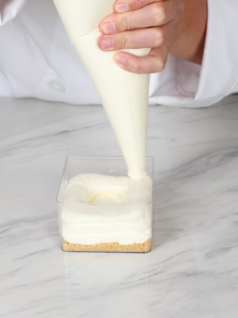 Cheesecake filling in the pastry bag. 