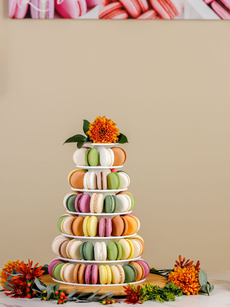 Macarons tower on the table. 