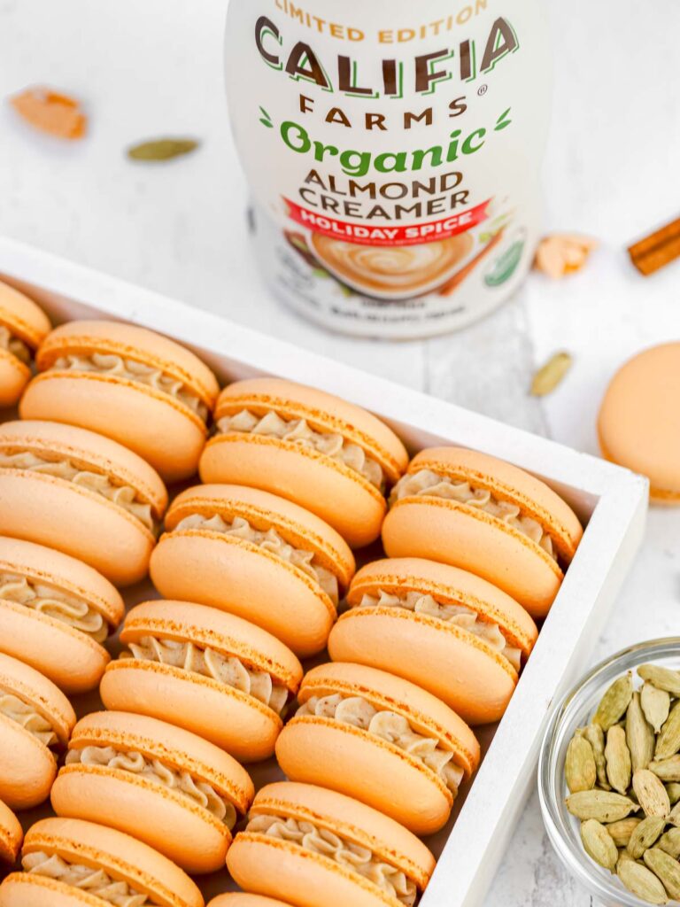 Cinnamon Cardamom Macarons in the white box.