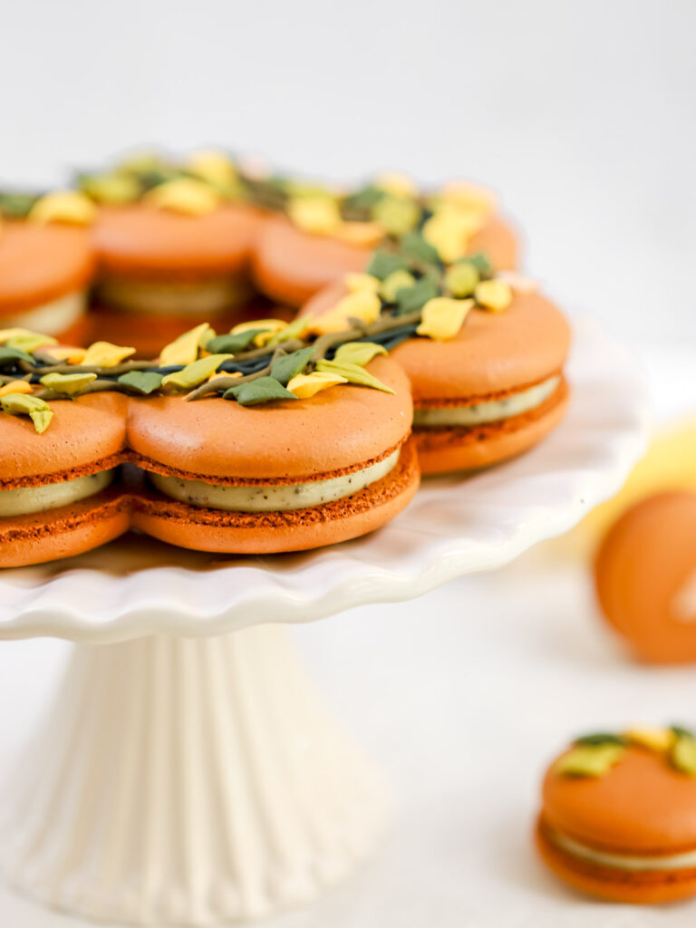 Thanksgiving Wreath Macaron Centerpiece on the cake stand.