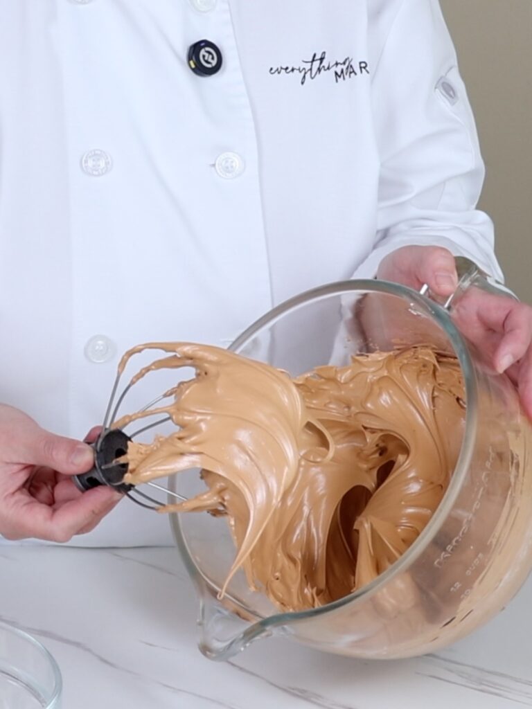 Brown meringue on the whisk.