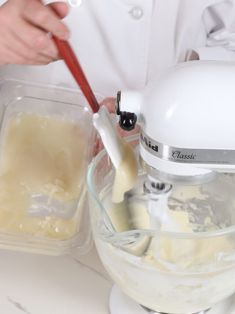 Add the flour mixture to the mixing bowl.