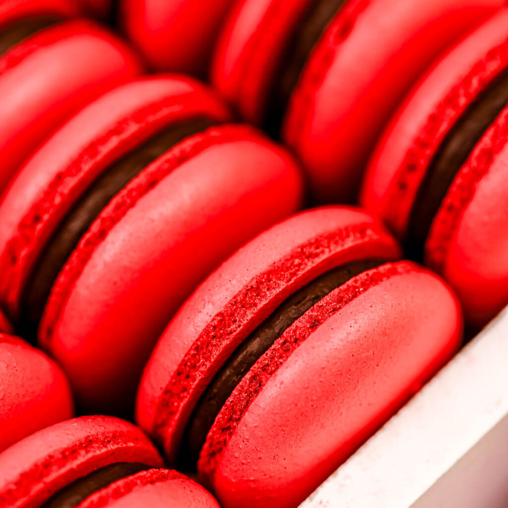 Red macarons in the box.
