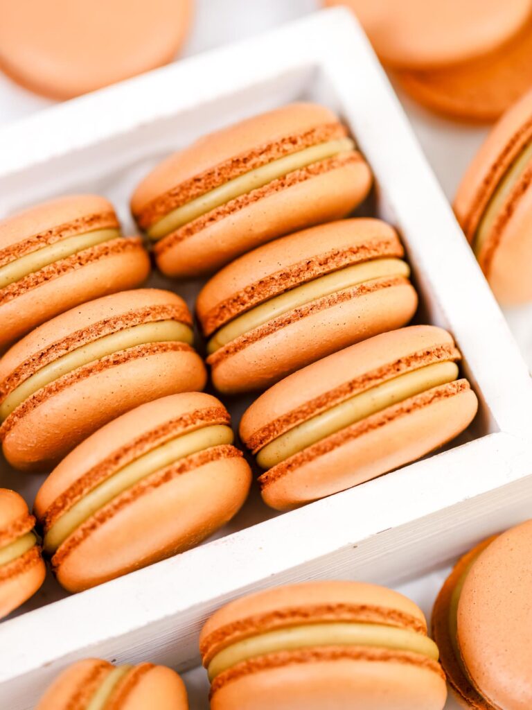 Gingerbread latte macarons in the box. 