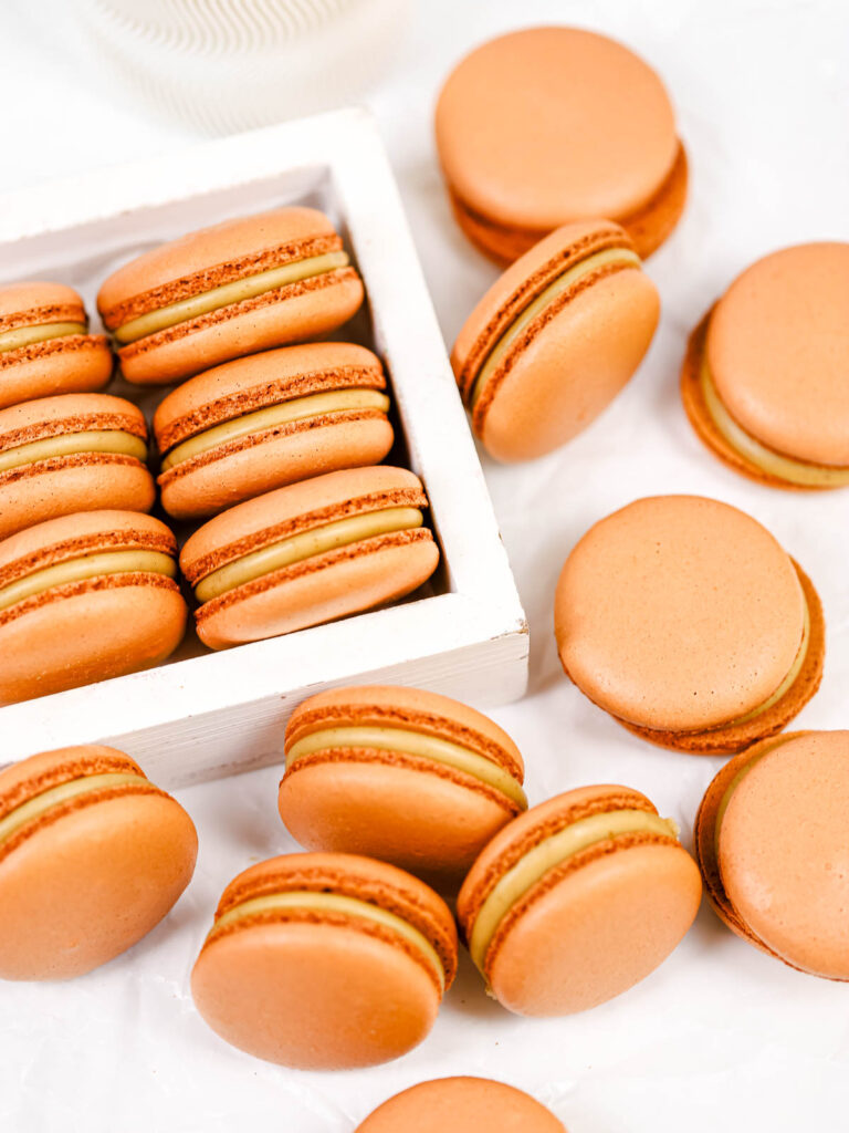 Giingerbread latte macarons in the box. 