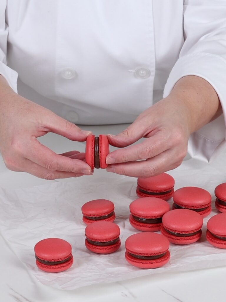 Assemble peppermint mocha macarons. 
