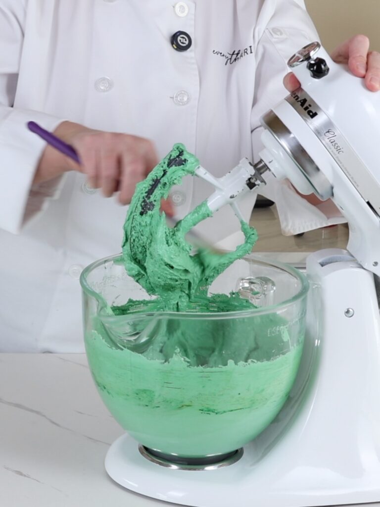 Macaronage with paddle attachment in the mixing bowl. 