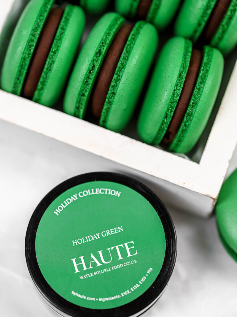 Green macarons in the box. 