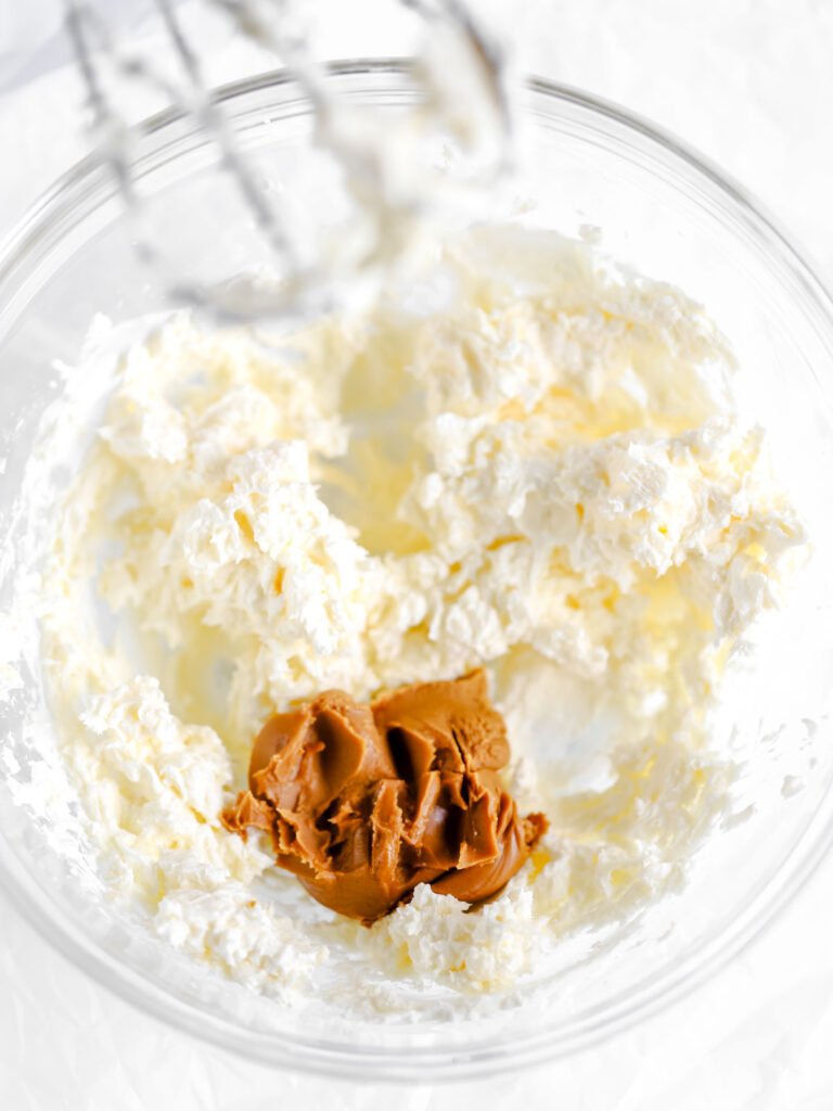 Mixing bowl with butter and cream cheese. 