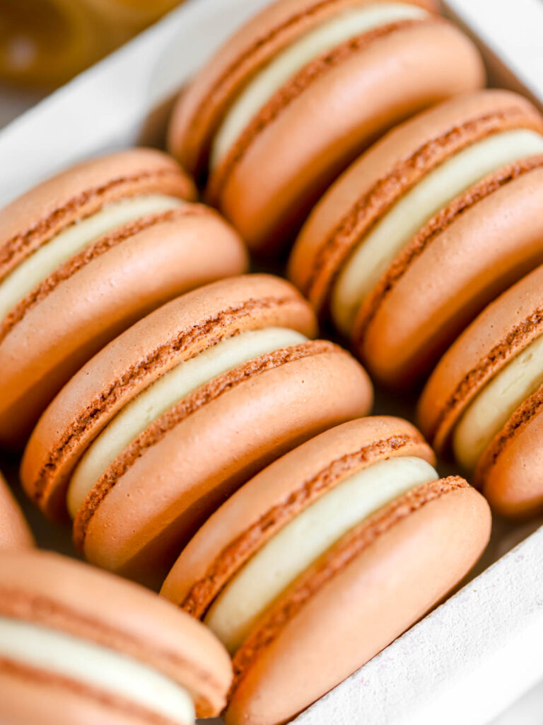 Bifcoff cookie butter macarons in the box. 