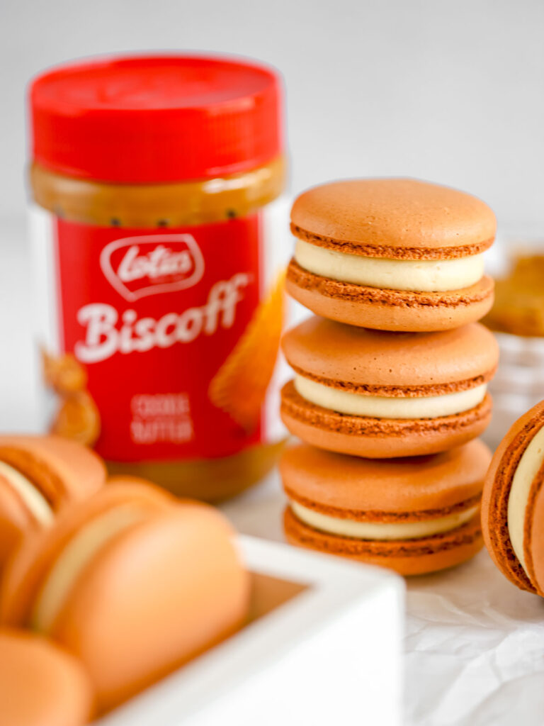Biscoff cookie butter macarons on the table.