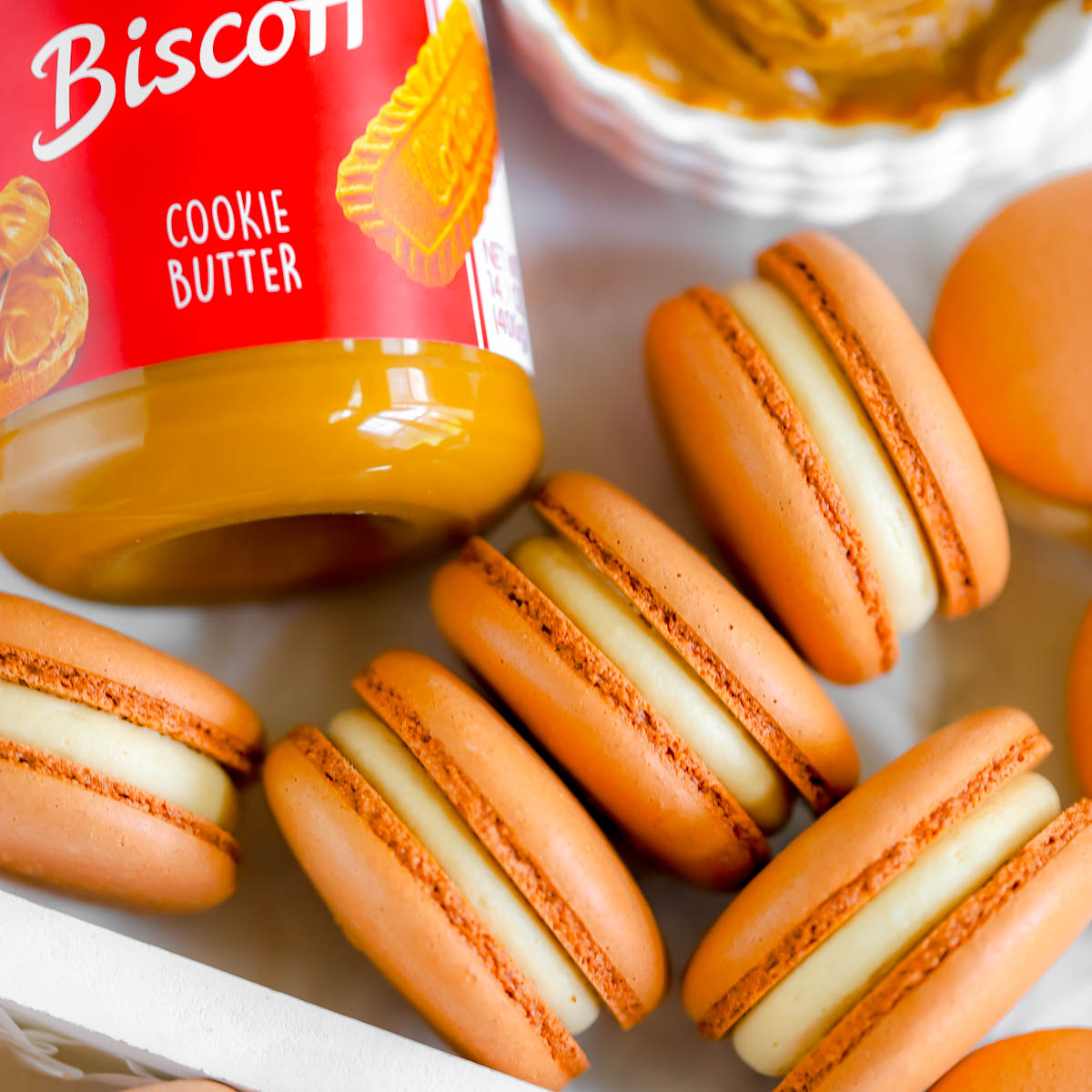 Biscoff cookie butter macarons on the table.