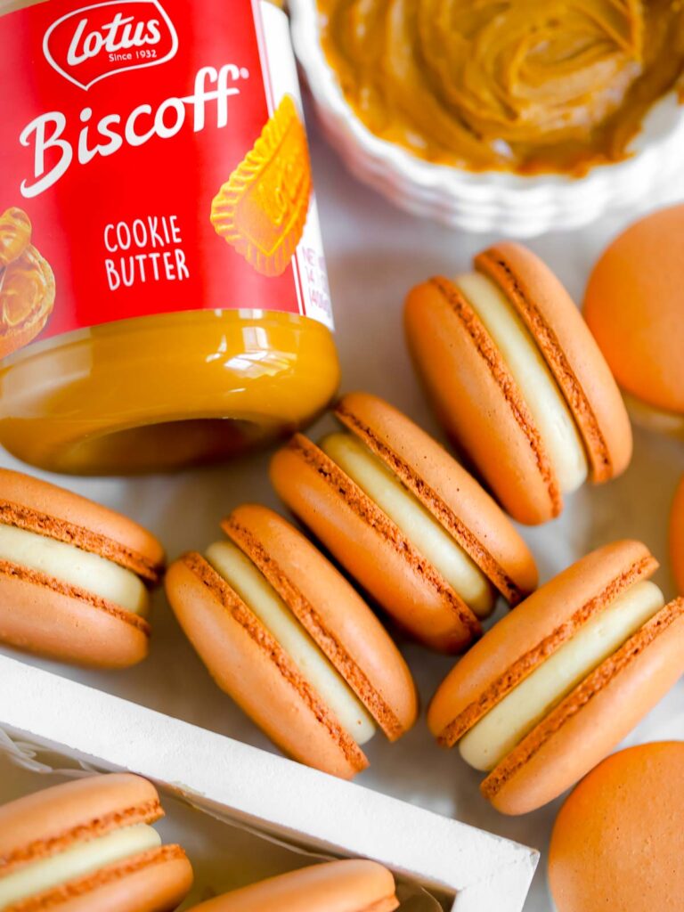 Biscoff cookie butter macarons on the table. 