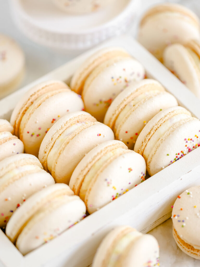Birthday cake macarons in the box. 