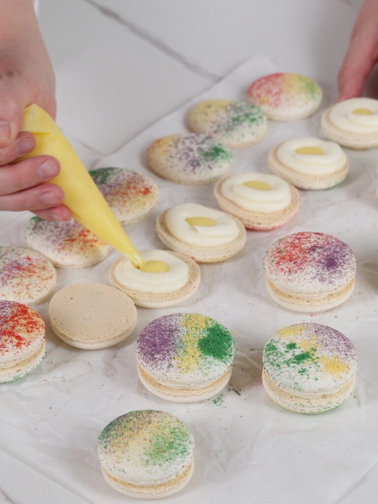 Assembling easter macarons. 