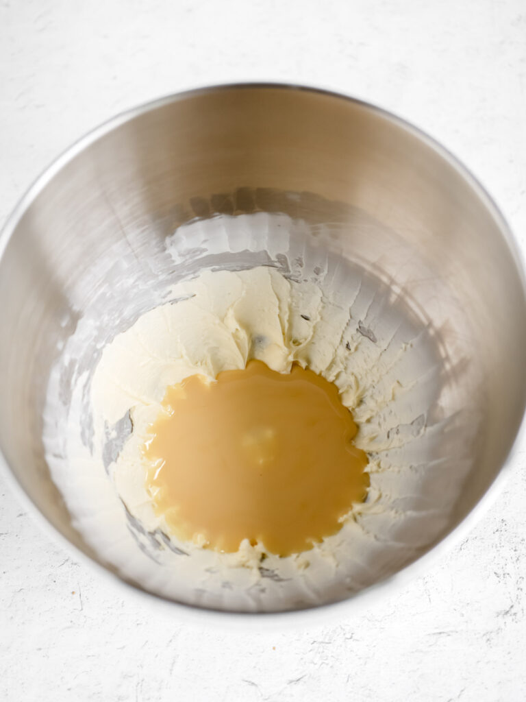Butter and condensed milk in the bowl. 
