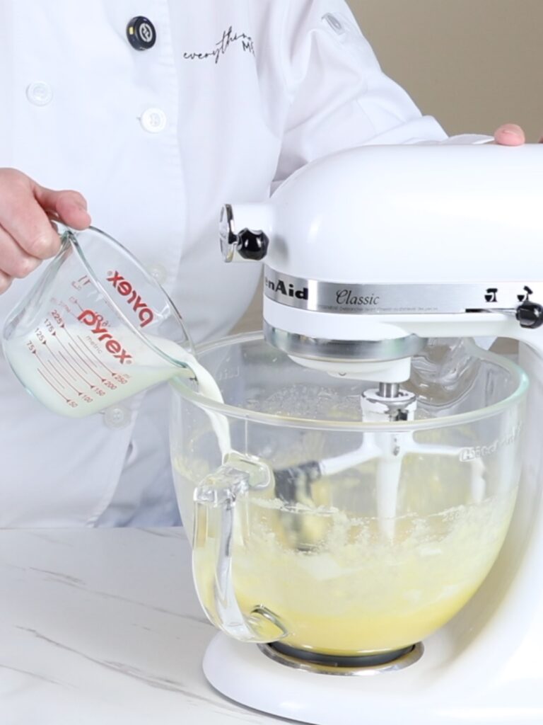 Add milk to the batter. 