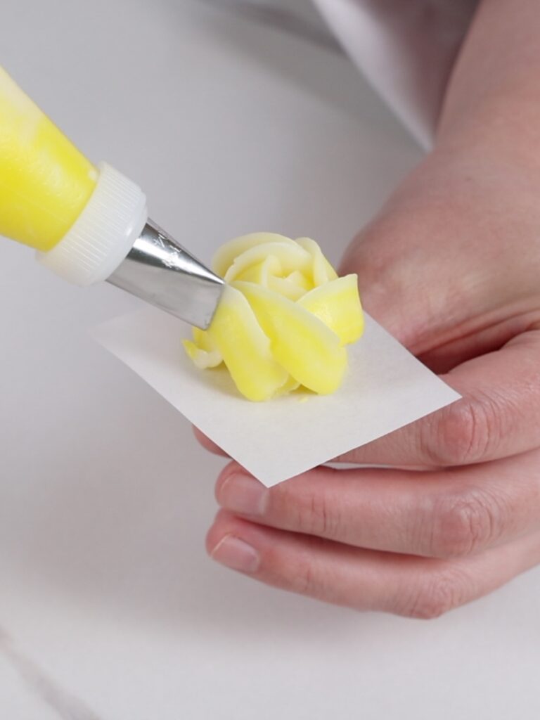 Pipping rose on the flower nail. 