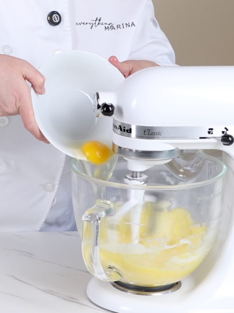 Add eggs to the mixing bowl. 