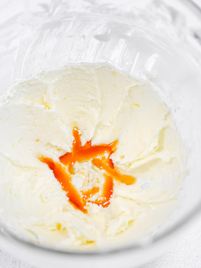 Butter and vanilla in the bowl. 