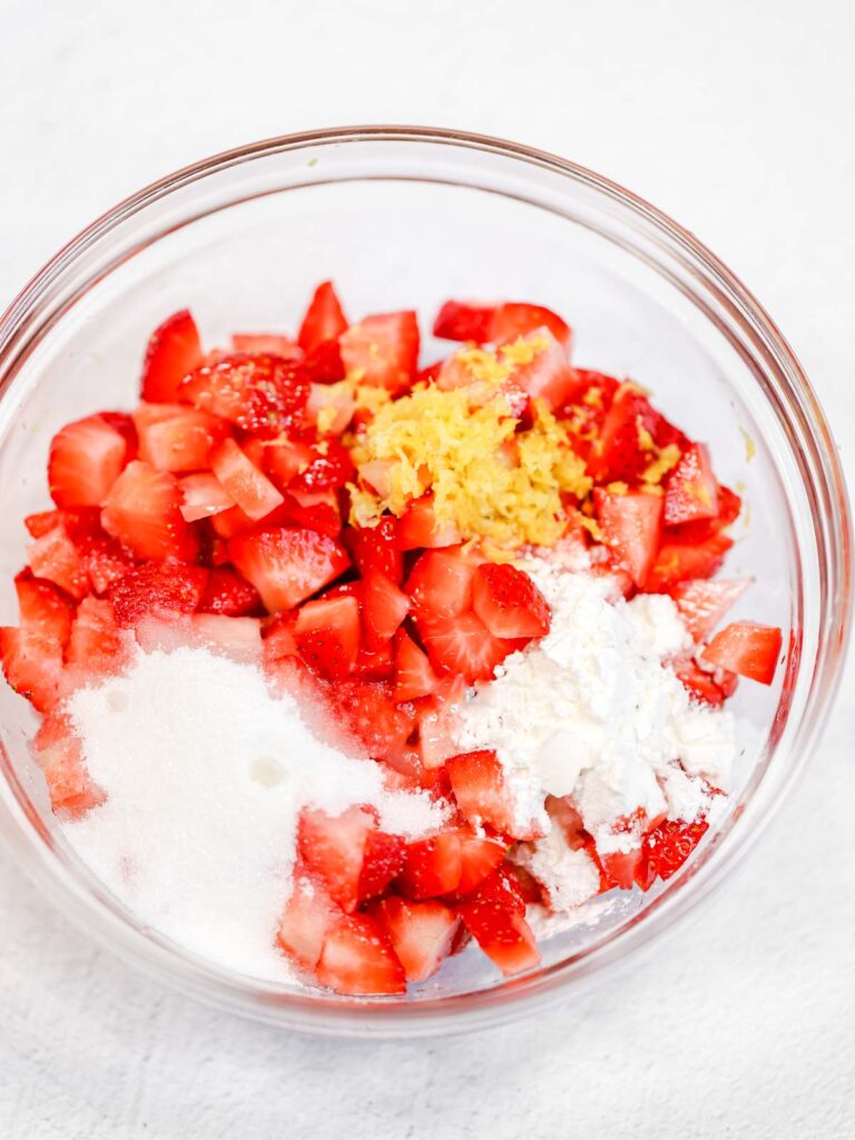 Cut strawberries into the bowl.